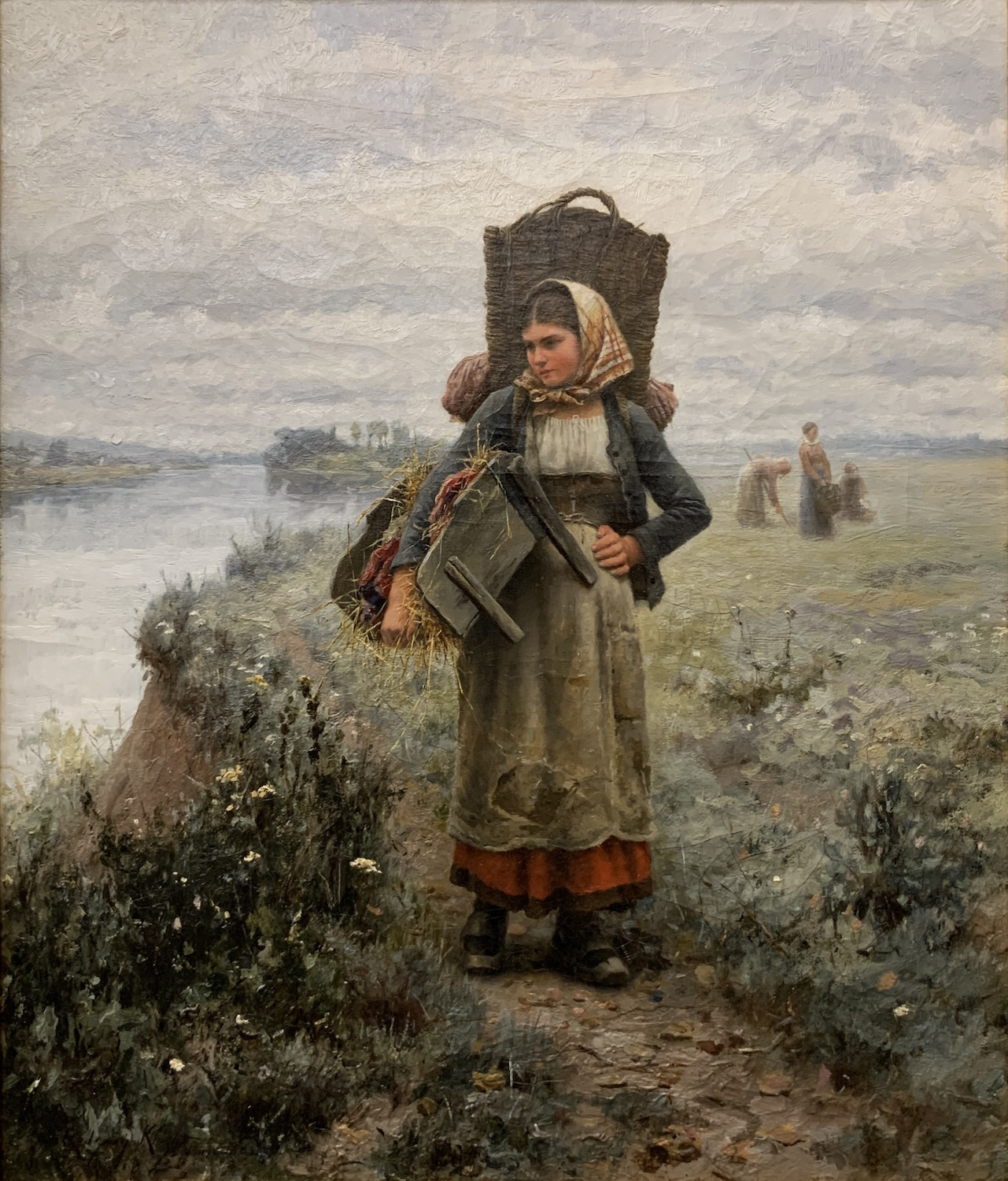 Woman walking by the water