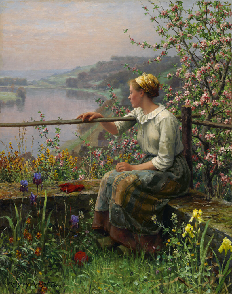 woman seated in a garden