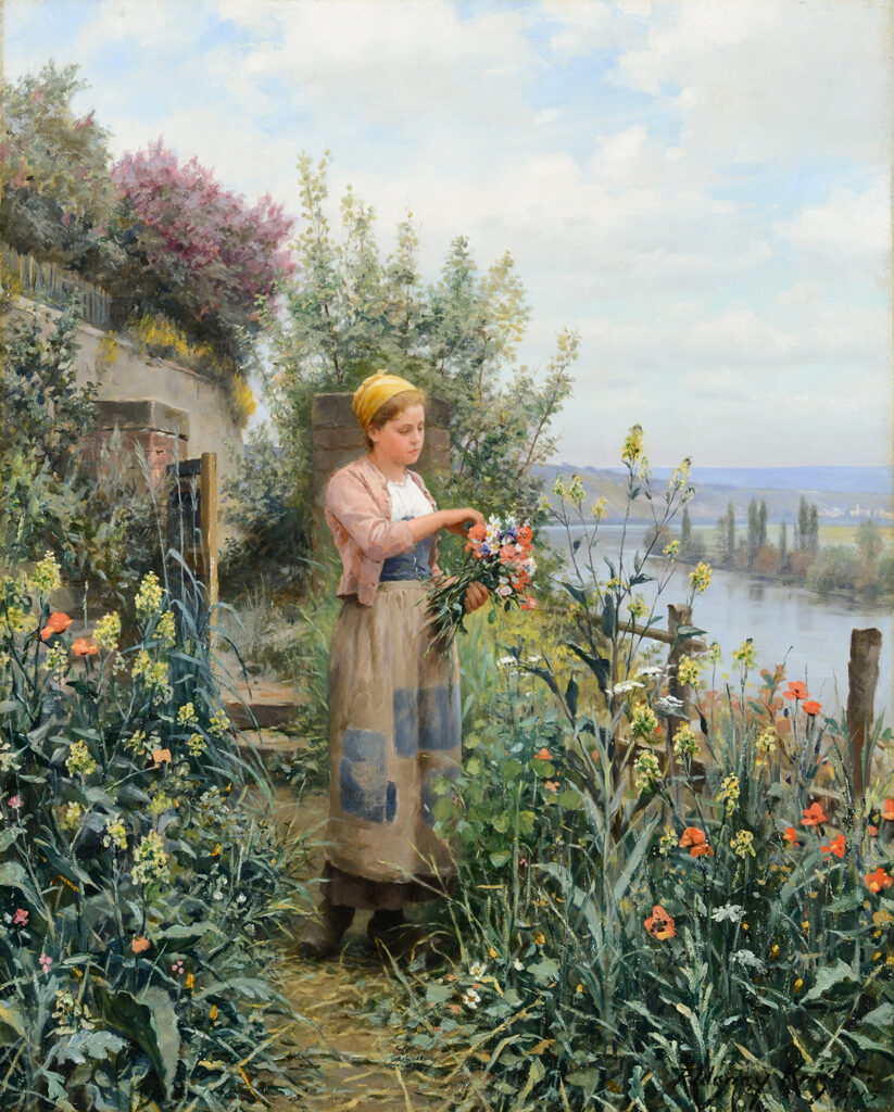 Young girl gathering flowers